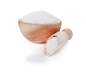 Photo of Wooden bowl and scoop with natural sea salt isolated on white