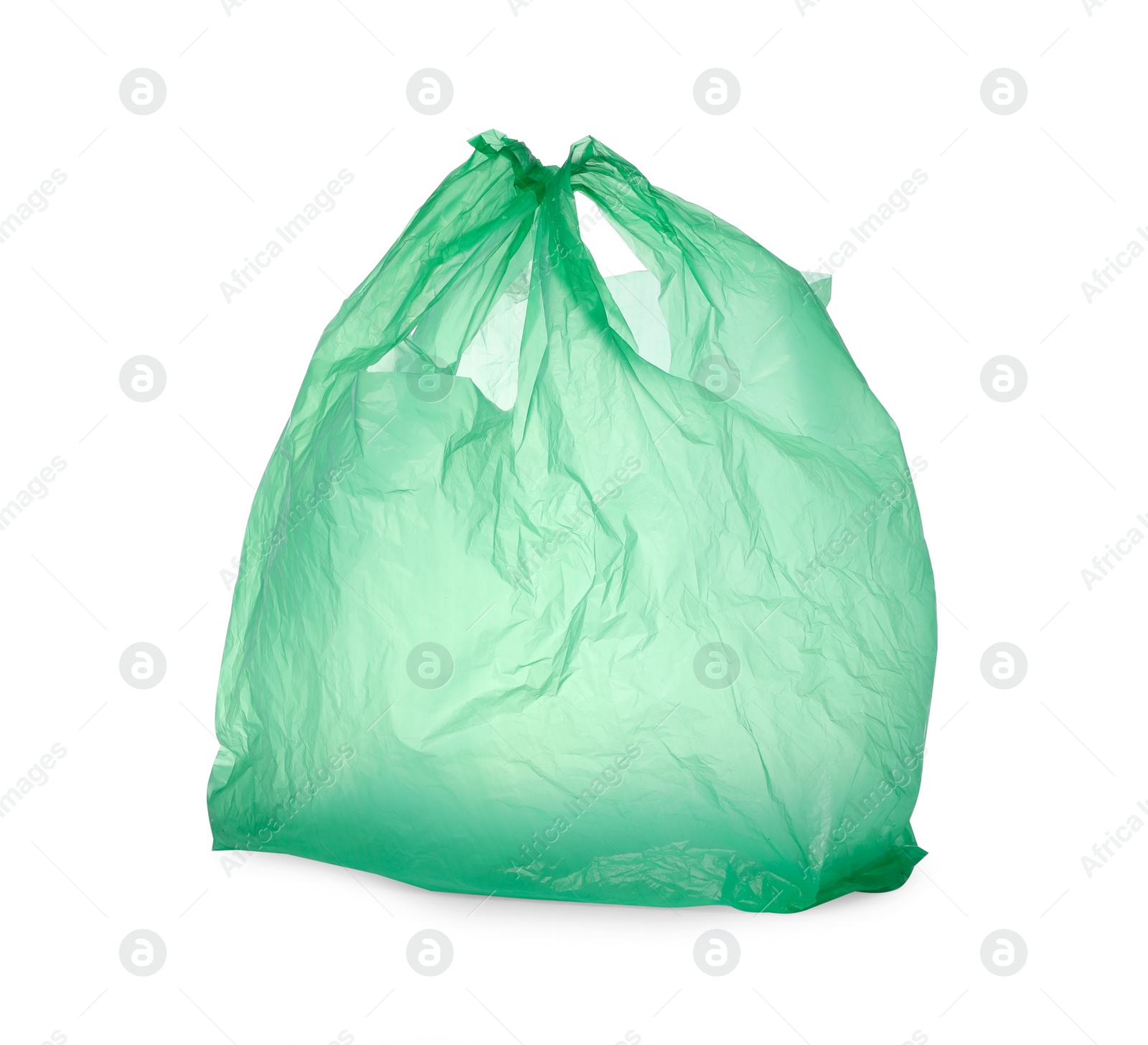 Photo of One green plastic bag isolated on white