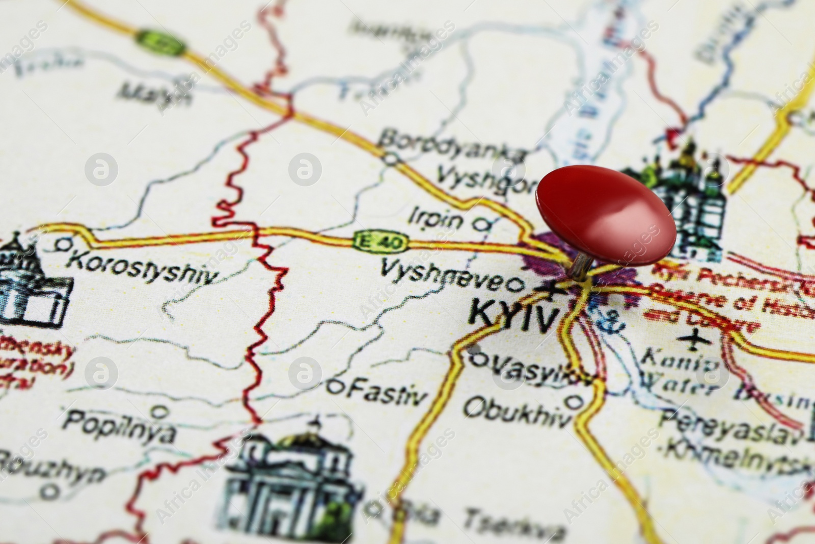 Photo of MYKOLAIV, UKRAINE - NOVEMBER 09, 2020: Kyiv city marked with push pin on map of Ukraine, closeup