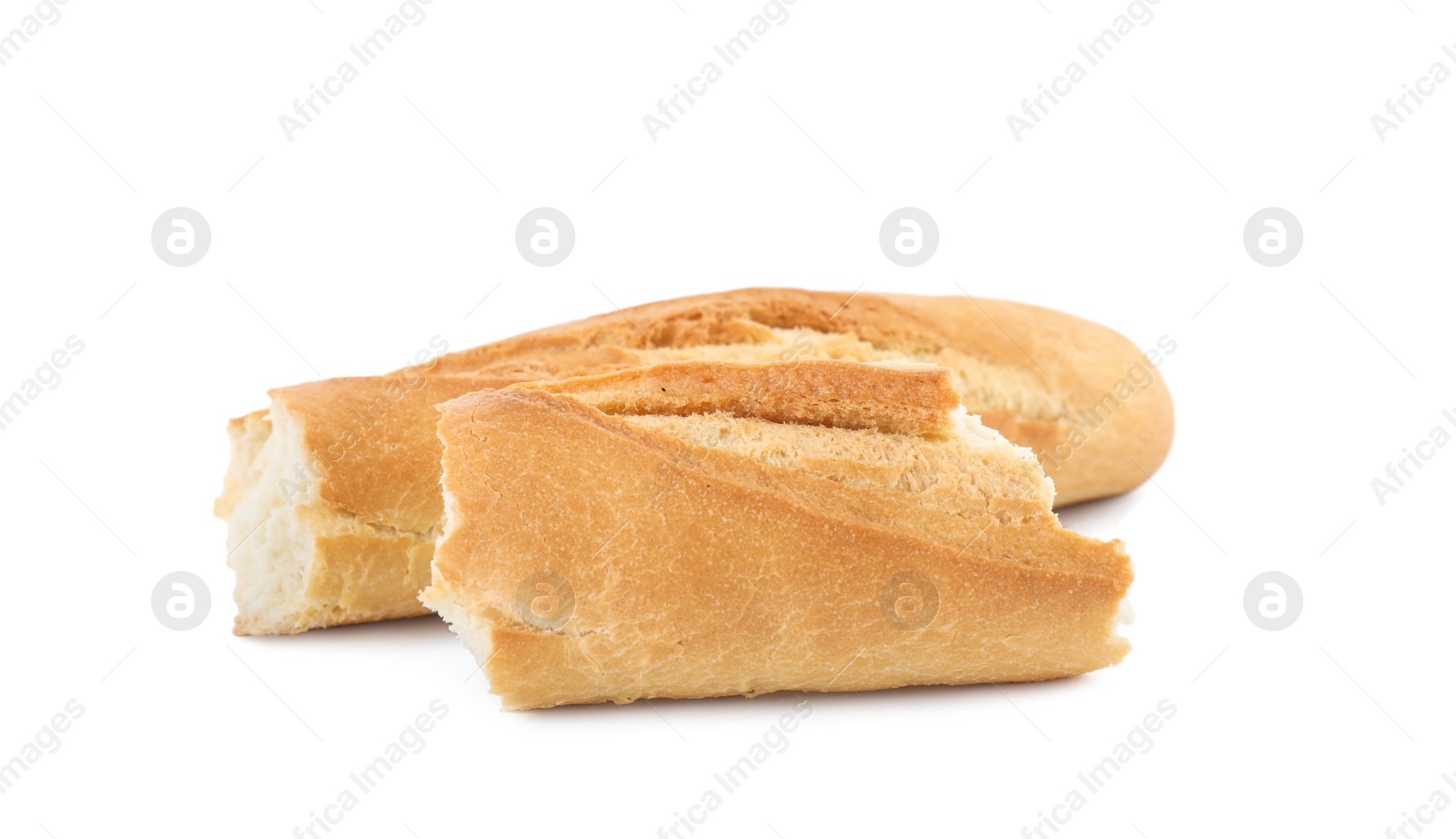 Photo of Pieces of fresh baguette on white background