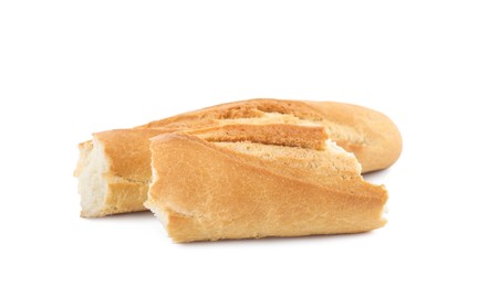 Photo of Pieces of fresh baguette on white background