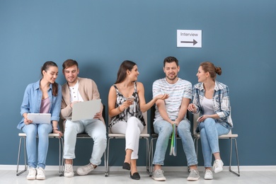 Group of people waiting for job interview, indoors