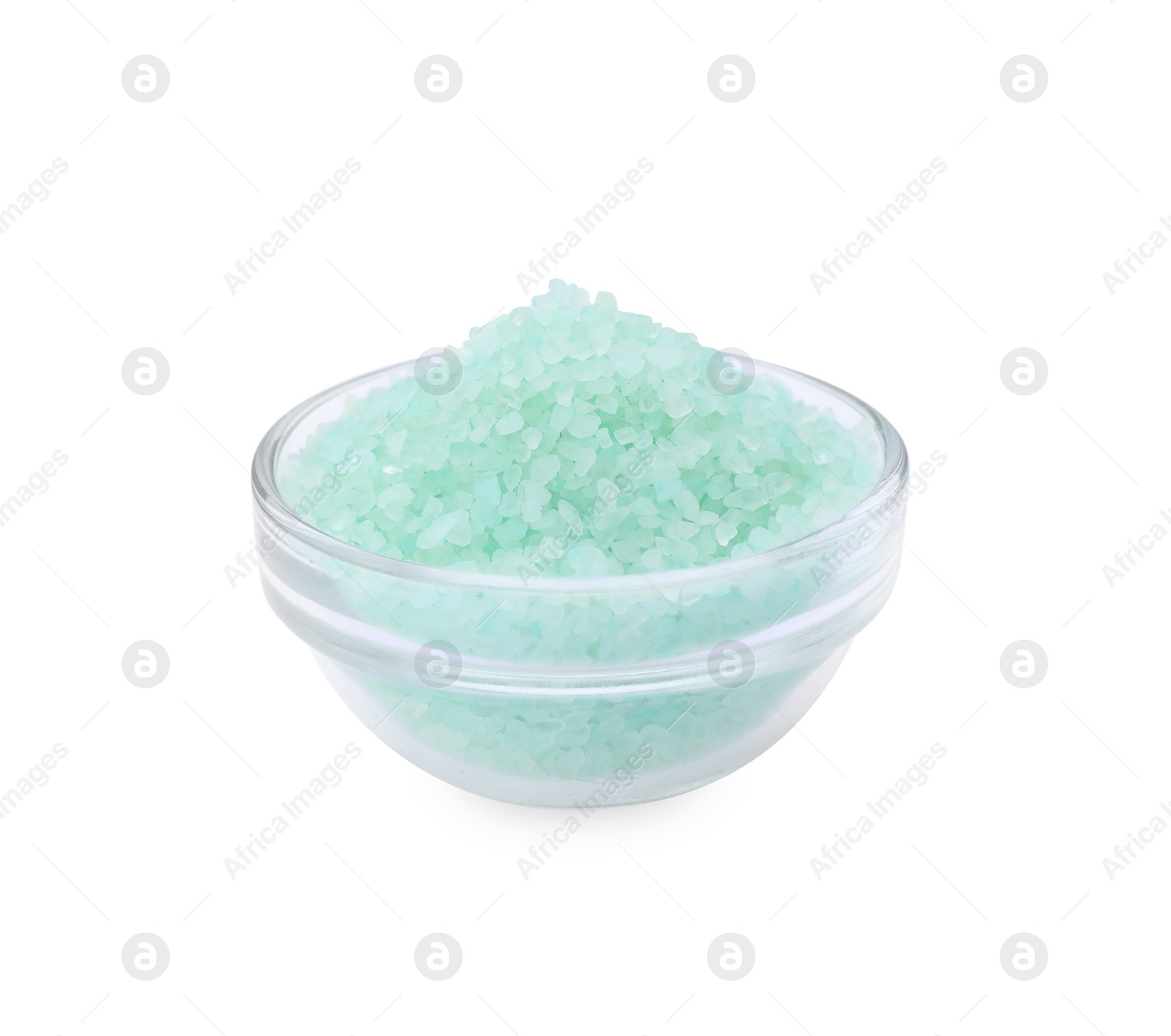 Photo of Glass bowl with turquoise sea salt isolated on white