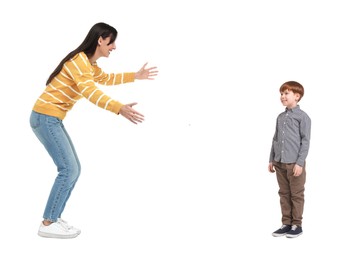 Mother reaching for her son on white background