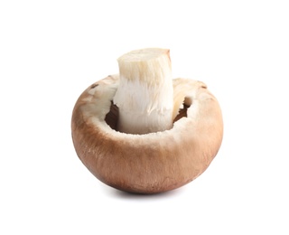 Fresh whole champignon mushroom isolated on white