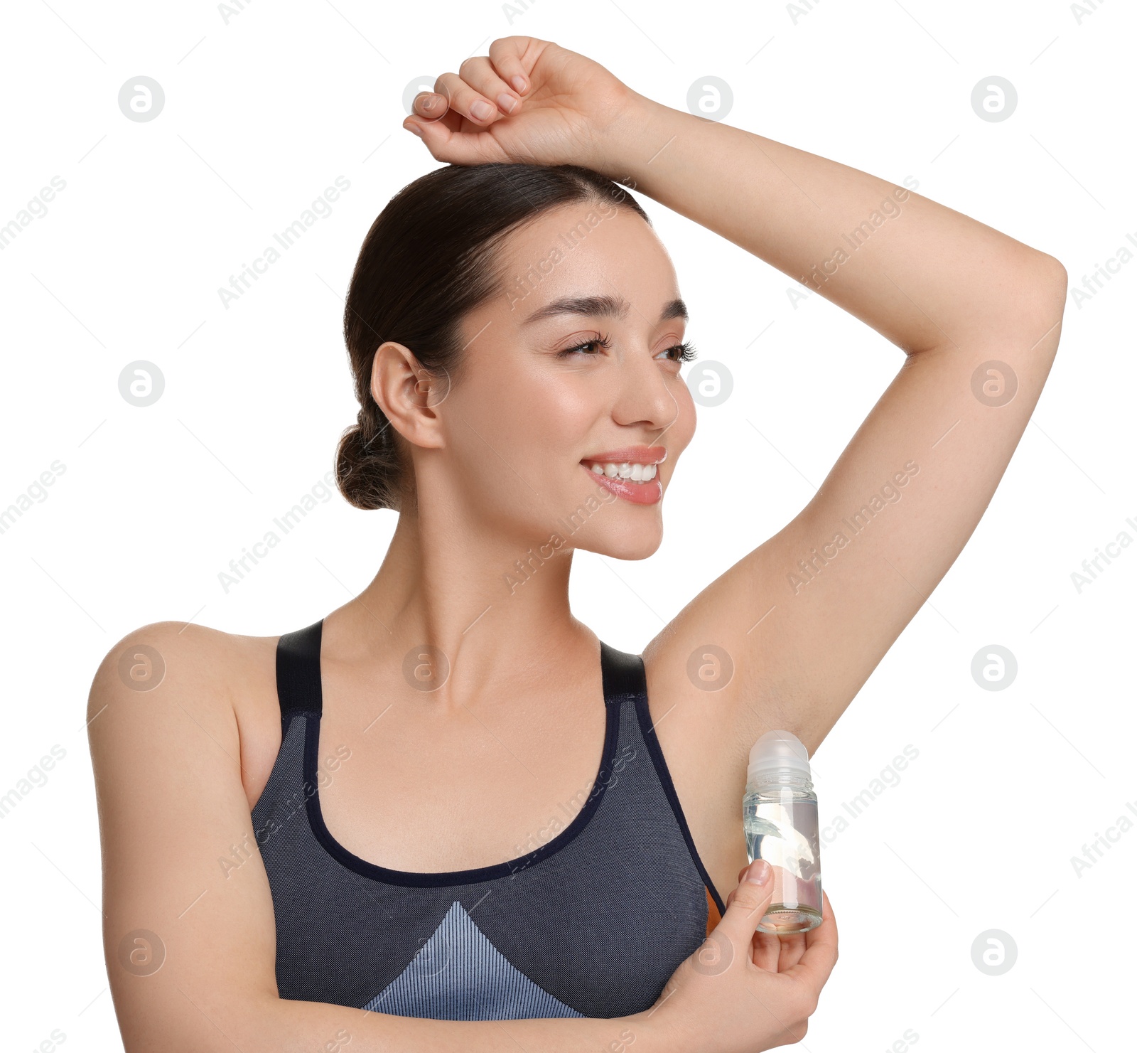 Photo of Beautiful woman applying deodorant on white background