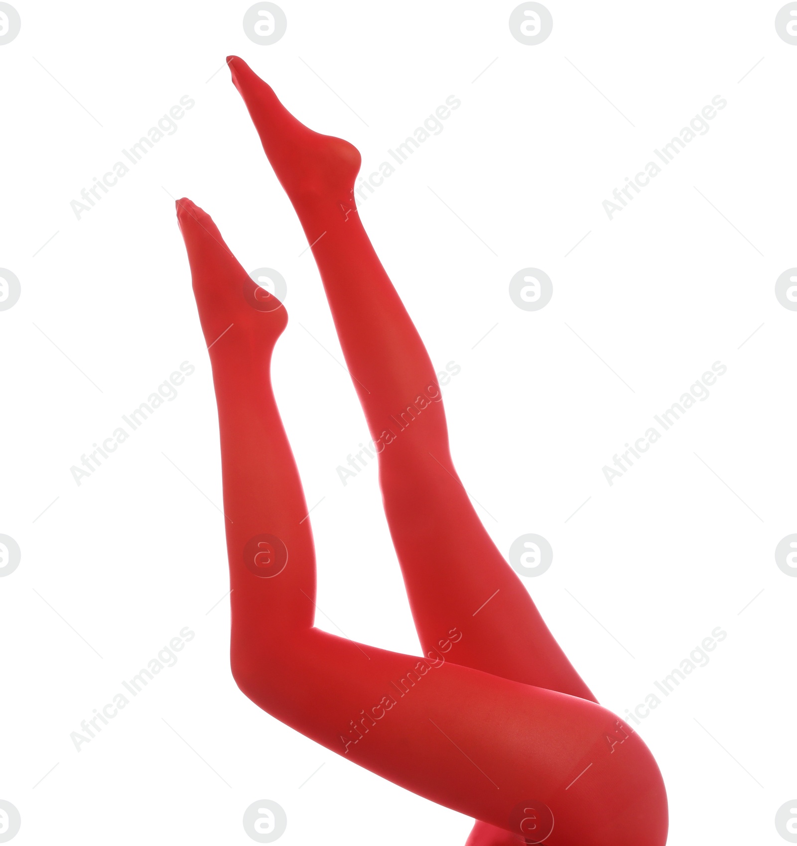 Photo of Woman wearing red tights on white background, closeup of legs