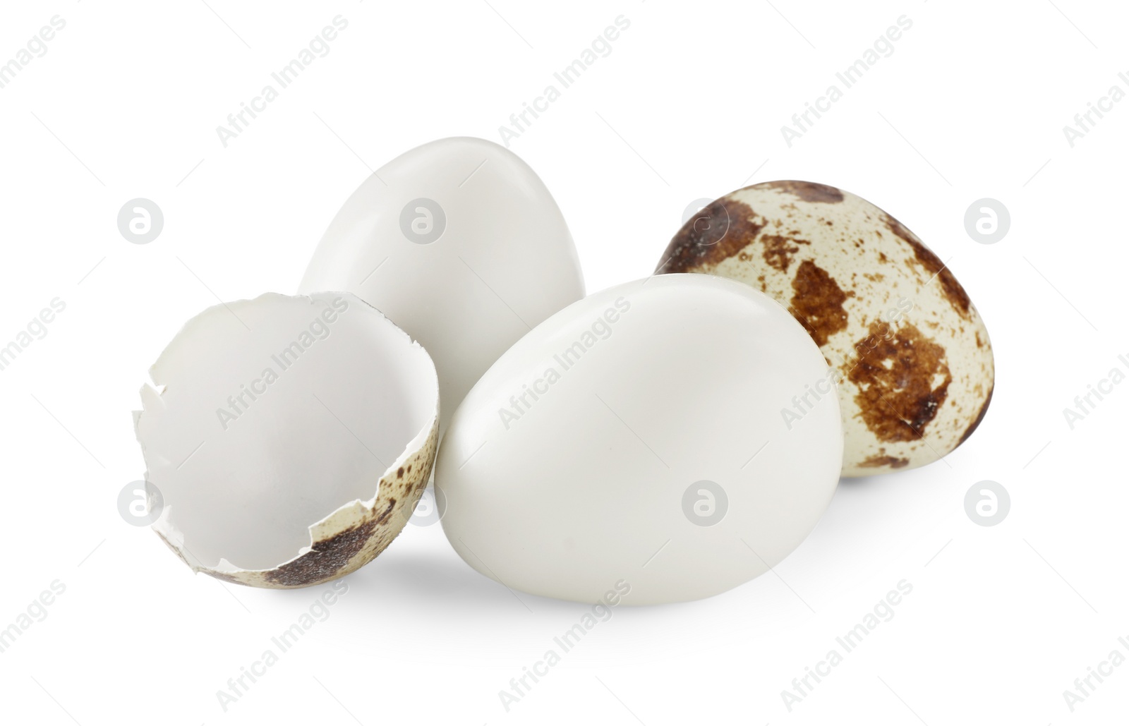 Photo of Unpeeled and peeled boiled quail eggs on white background