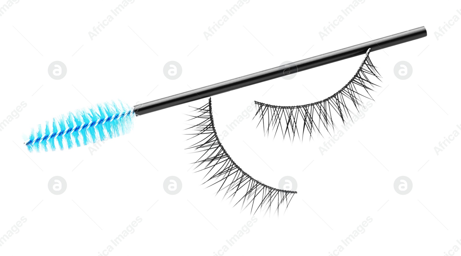 Photo of Fake eyelashes and brush on white background, top view