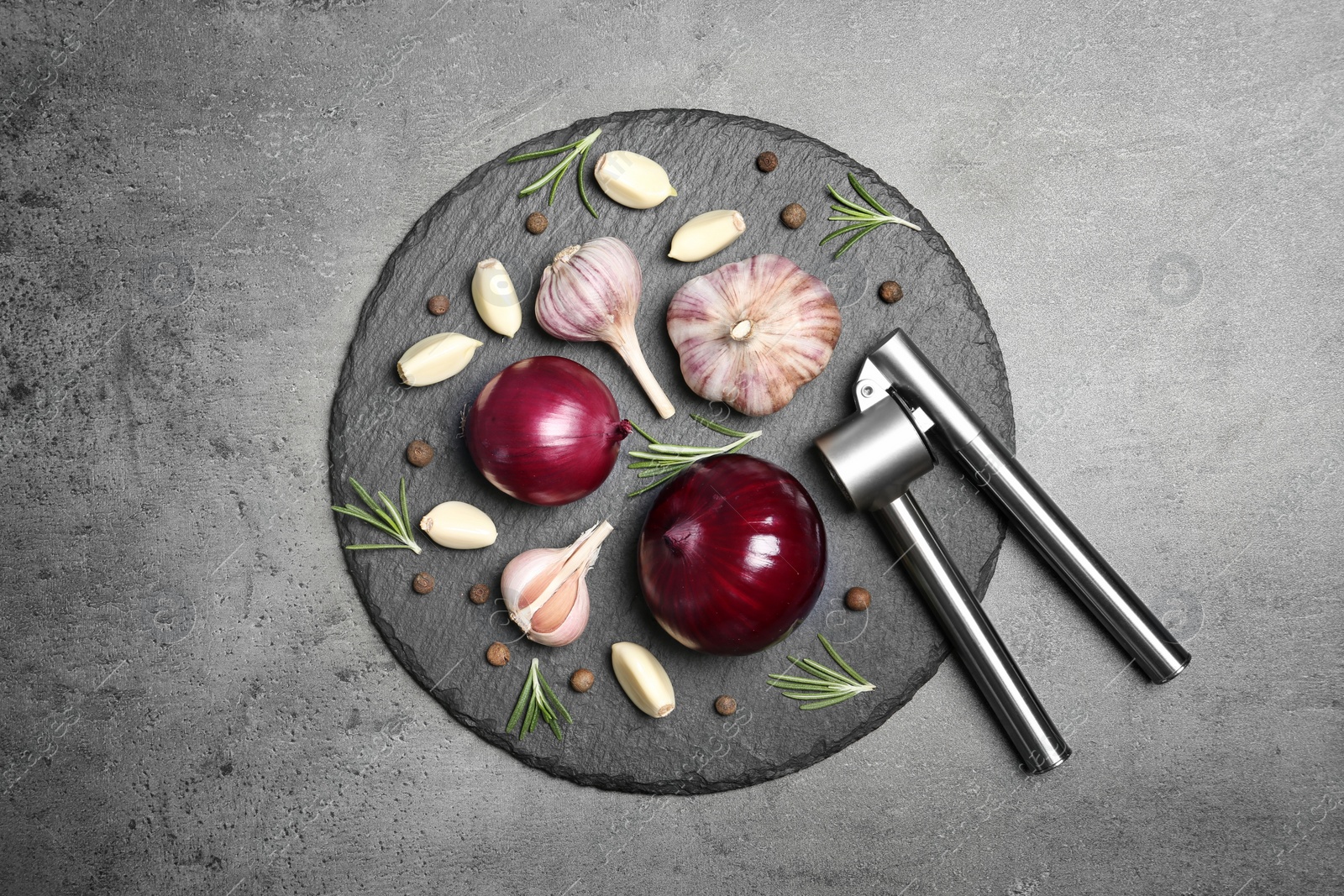 Photo of Flat lay composition with garlic and onion on table