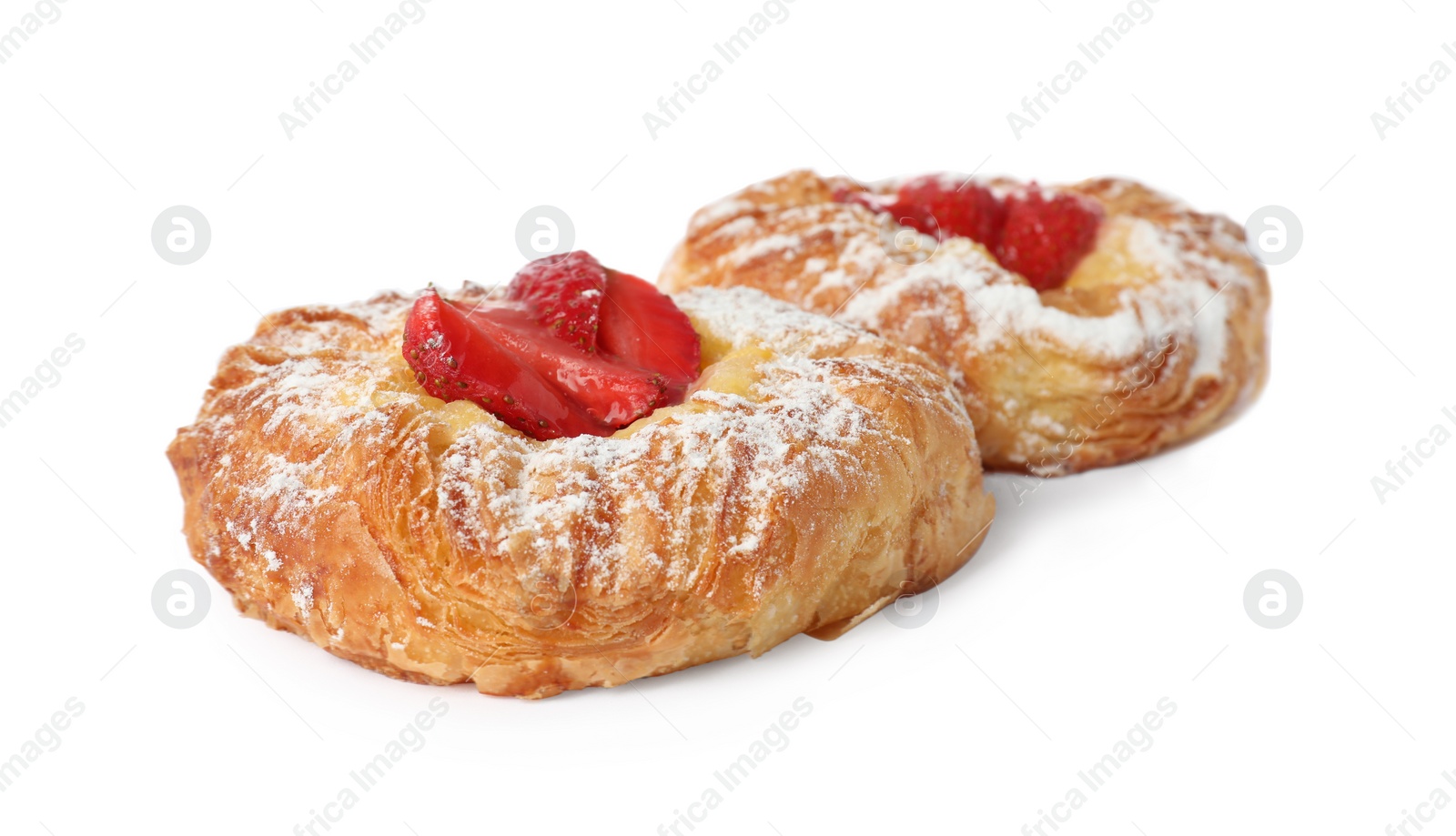 Photo of Danish pastries with strawberries isolated on white