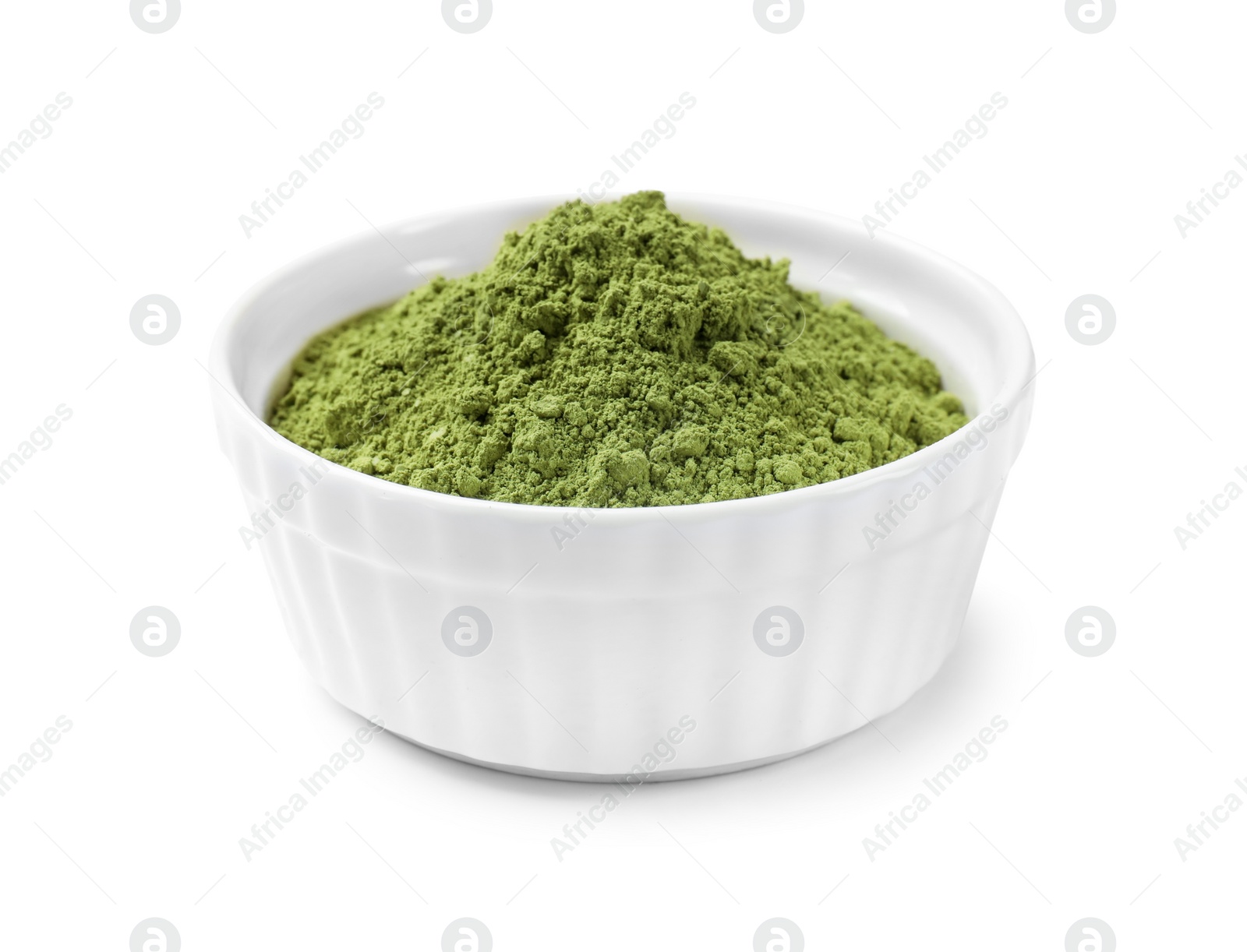 Photo of Green matcha powder in bowl isolated on white