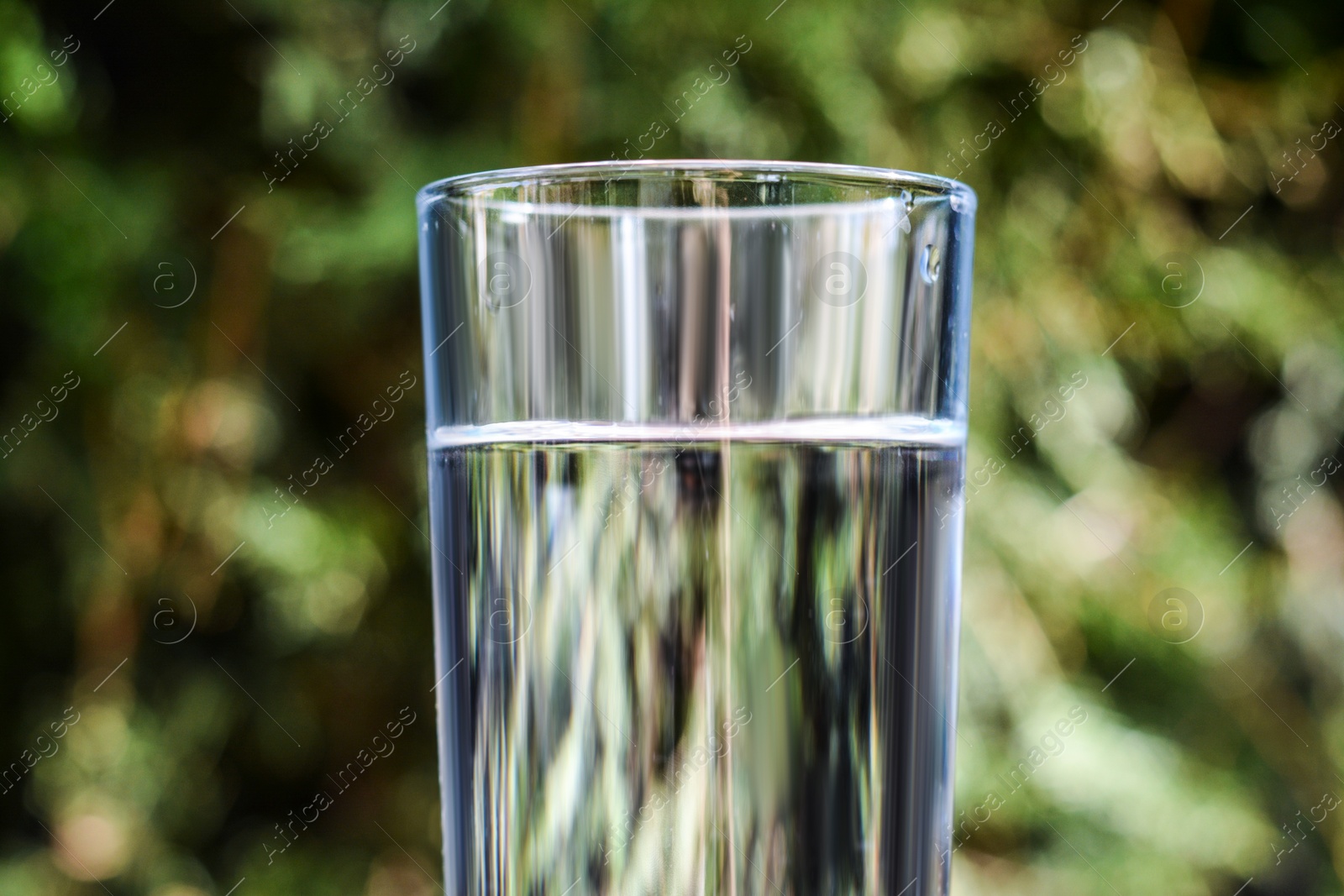 Photo of Closeup view of glass with water outdoors