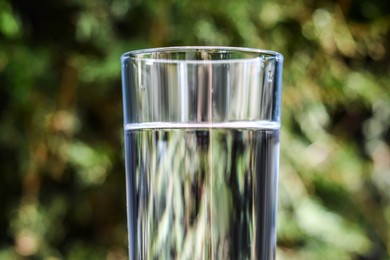 Photo of Closeup view of glass with water outdoors