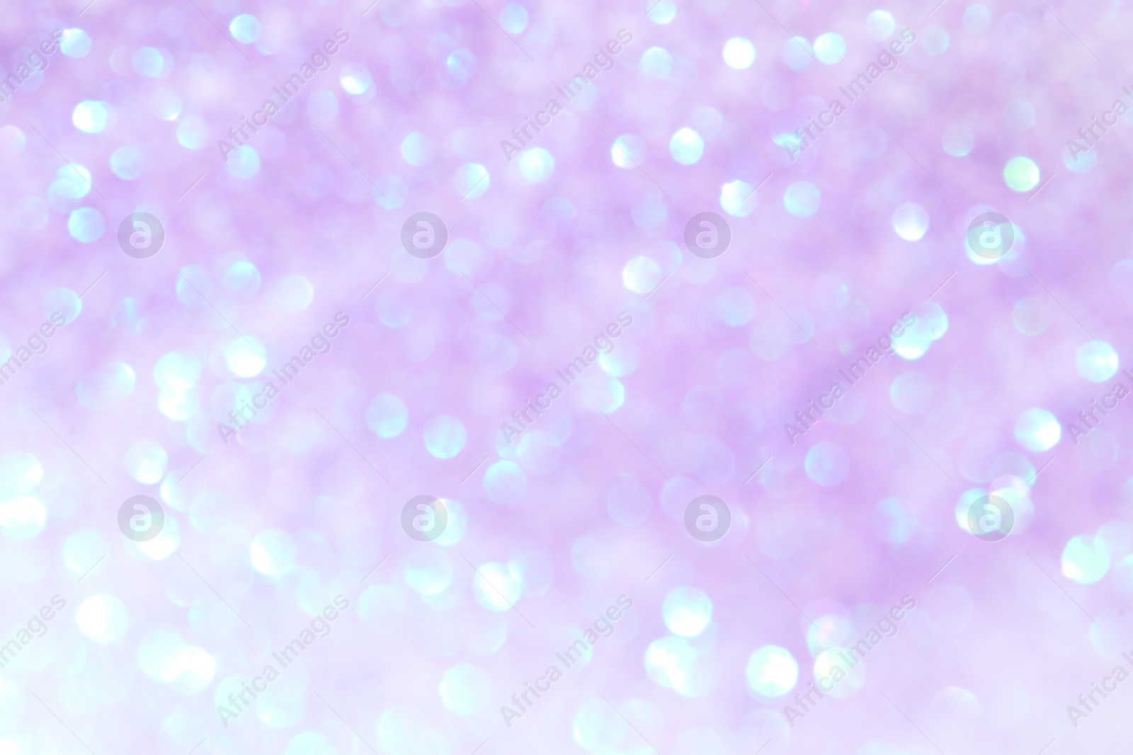 Photo of Shiny lilac background with magical bokeh effect