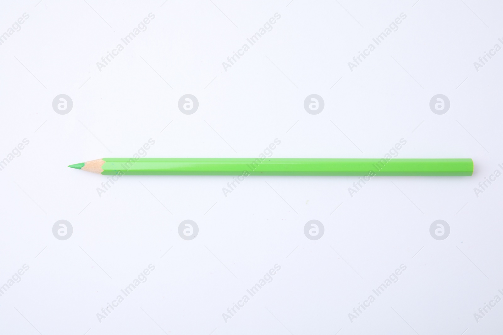 Photo of New green wooden pencil isolated on white