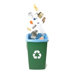 Image of Garbage falling into trash bin on white background