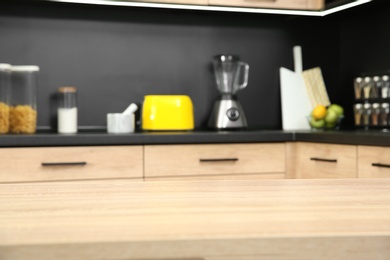 Countertop and blurred view of kitchen interior on background