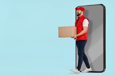 Courier with parcel walking out from huge smartphone on light blue background. Delivery service. Space for text