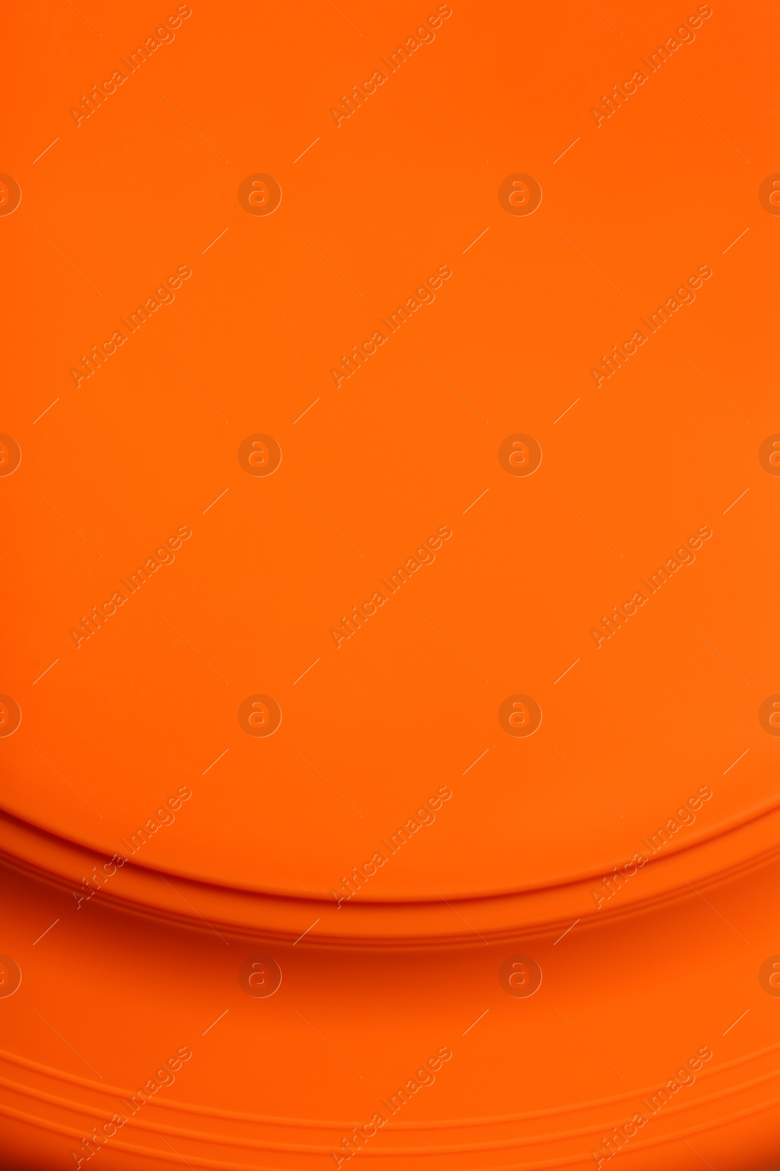 Photo of Orange textured surface as background, closeup view