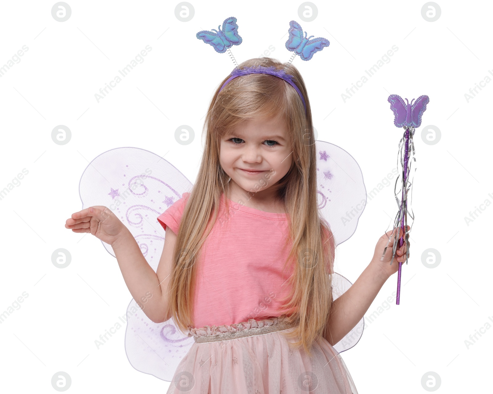 Photo of Cute little girl in fairy costume with violet wings and magic wand on white background