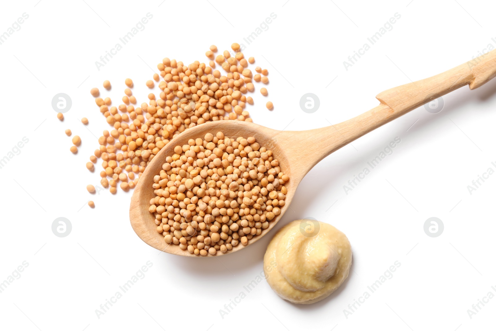 Photo of Mustard, seeds and wooden spoon on white background, top view