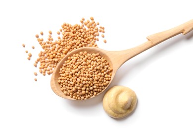 Photo of Mustard, seeds and wooden spoon on white background, top view