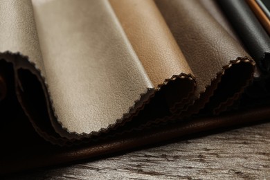 Photo of Different leather samples on table, closeup view