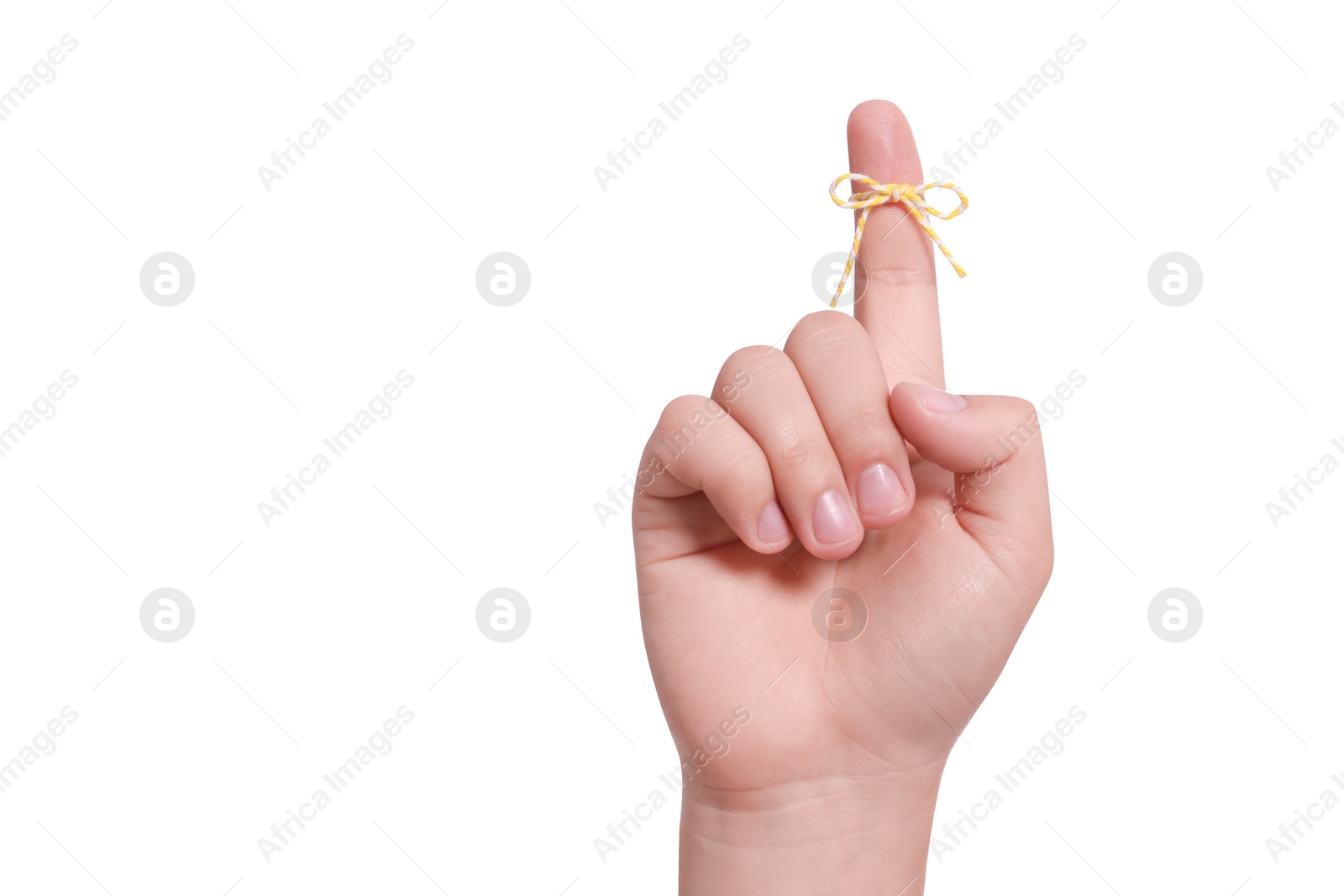 Photo of Man showing index finger with tied striped bow as reminder on white background, closeup