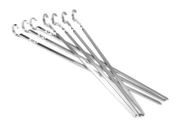 Photo of Metal skewers on white background. Barbecue utensil