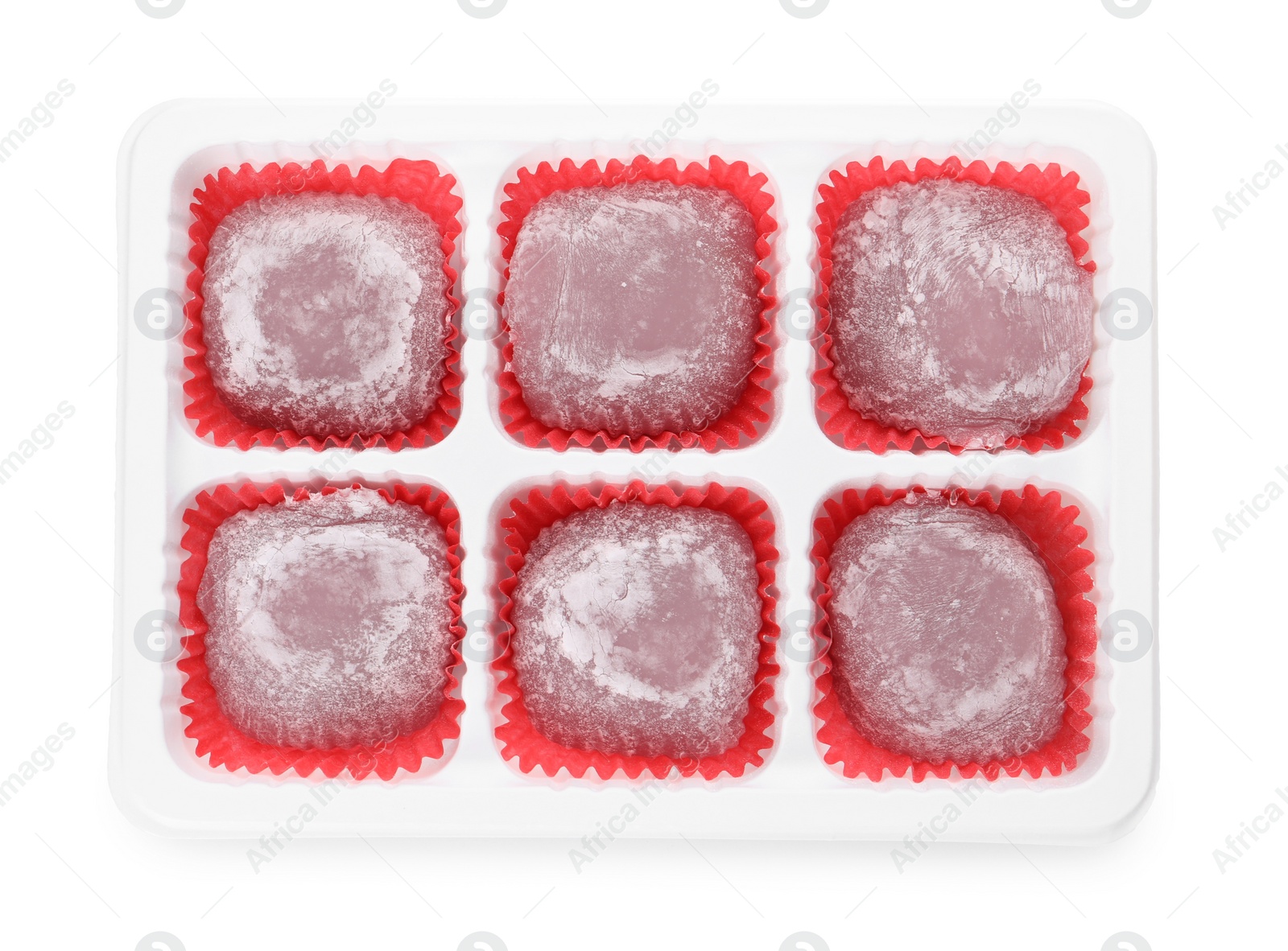 Photo of Delicious mochi in plastic tray on white background, top view. Traditional Japanese dessert