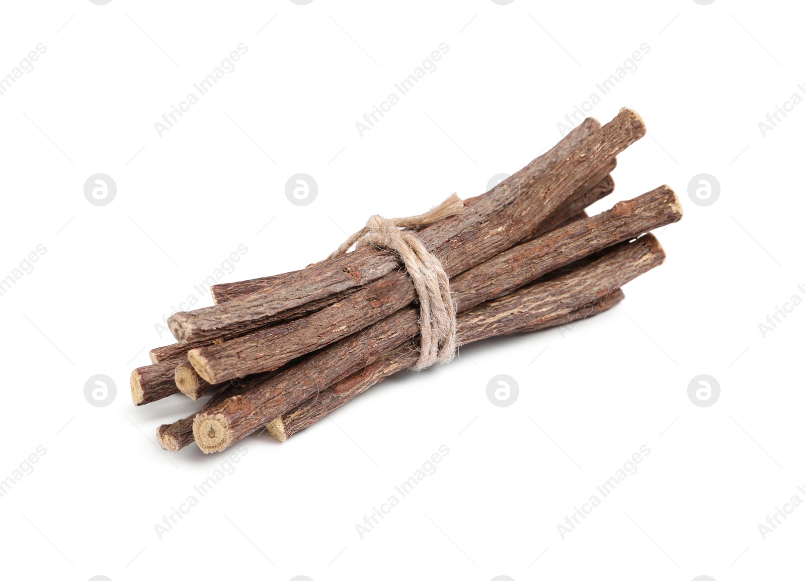 Photo of Dried sticks of liquorice root on white background