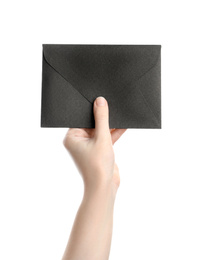 Photo of Woman holding black paper envelope on white background, closeup