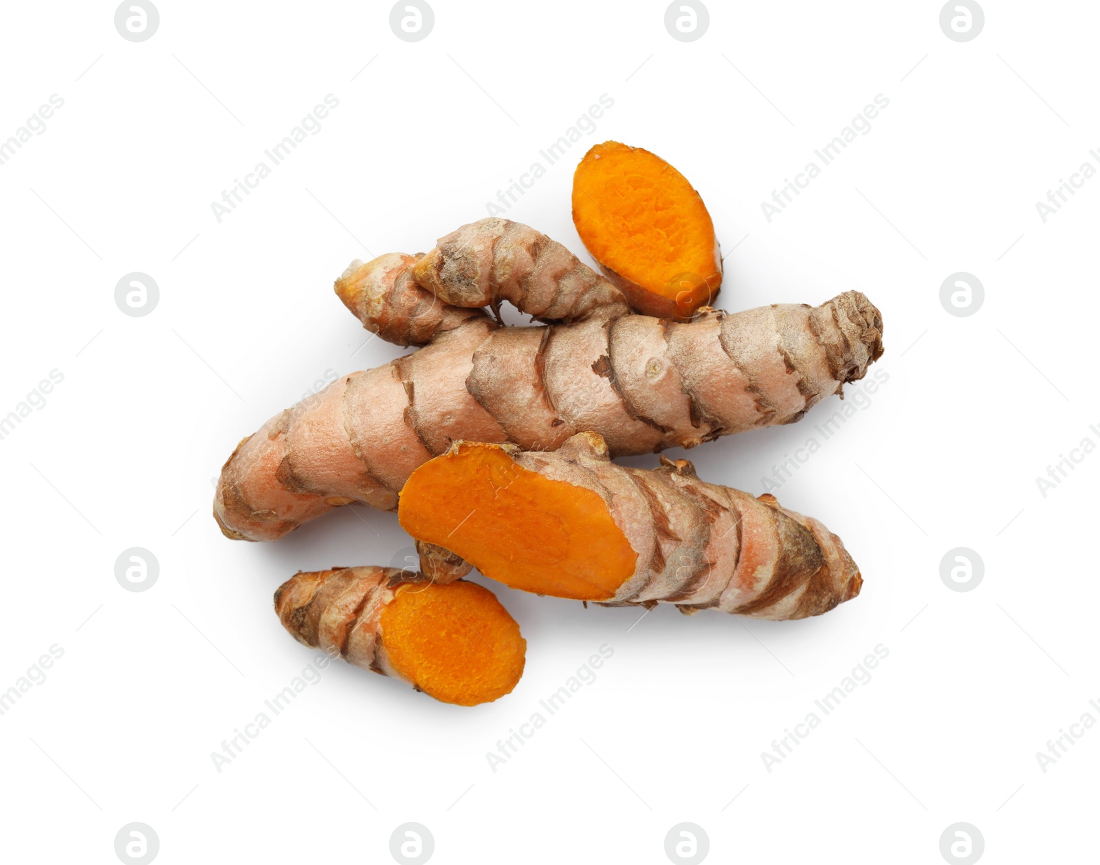 Photo of Fresh turmeric roots isolated on white, top view