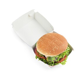 Delicious burger with beef patty and lettuce in box isolated on white