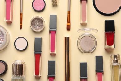 Photo of Beautiful composition with lipsticks on color background, flat lay