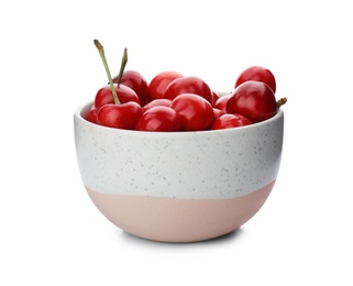 Bowl with sweet red cherries on white background