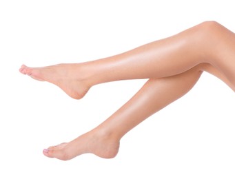 Woman showing beautiful legs after epilation on white background, closeup