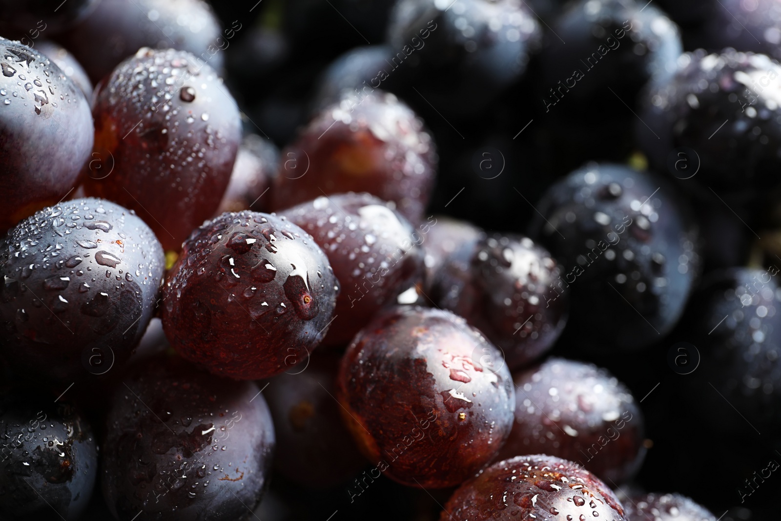 Photo of Bunch of fresh ripe juicy grapes as background, closeup