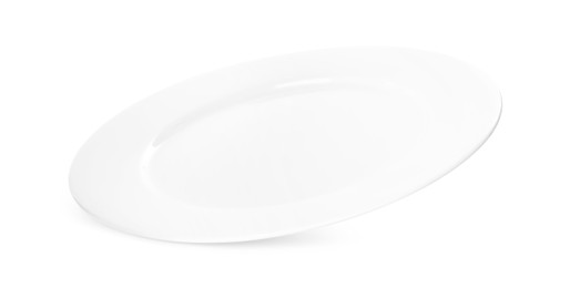 Photo of Clean empty ceramic plate isolated on white