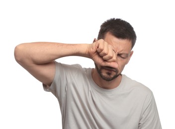 Man suffering from eyestrain on white background