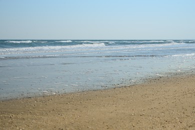 Photo of Beautiful view of sea shore and blue sky on sunny day