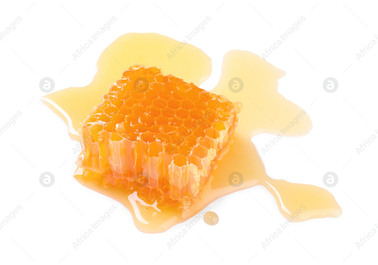 Photo of Natural honeycomb with tasty honey isolated on white