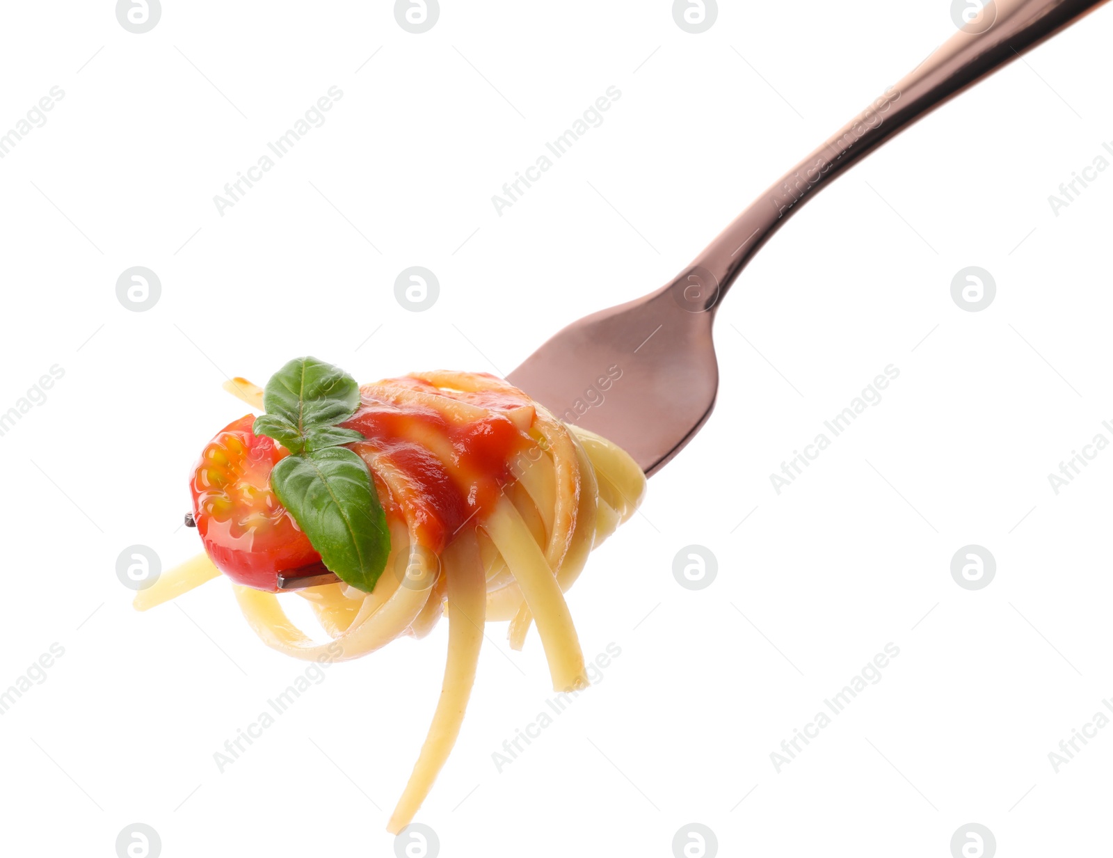 Photo of Fork with tasty pasta, tomato sauce and basil isolated on white