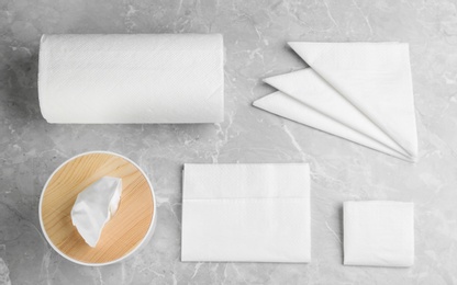 Photo of Flat lay composition with tissues on grey marble table