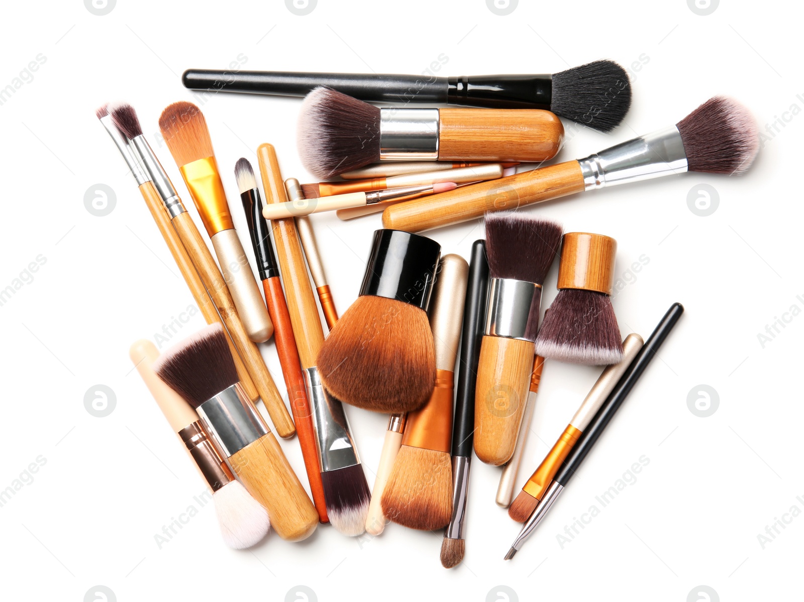 Photo of Makeup brushes of professional artist on white background