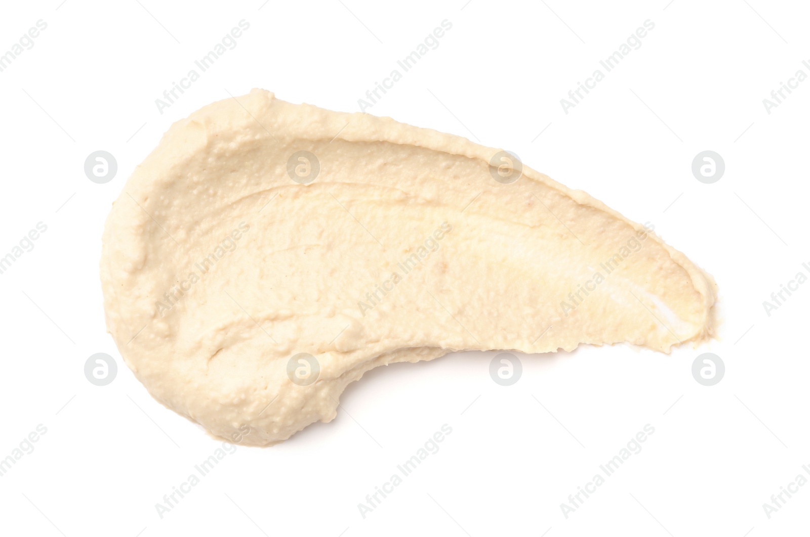 Photo of Smear of tasty hummus isolated on white, top view