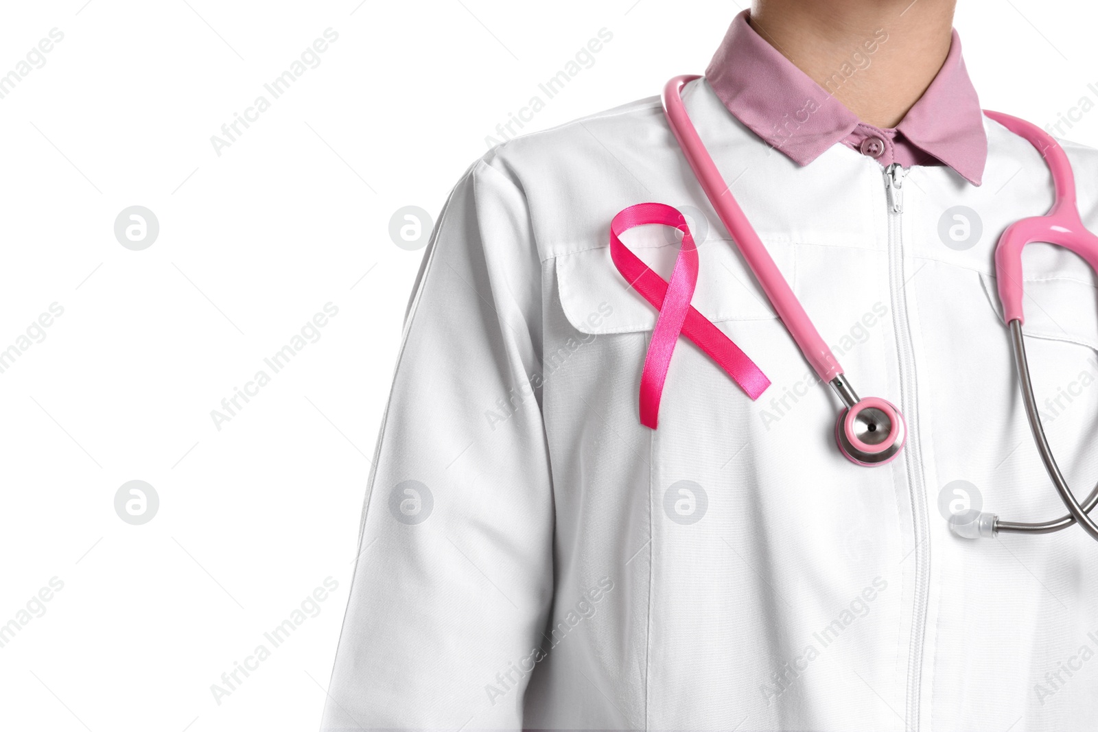 Photo of Doctor with pink ribbon and stethoscope on white background, closeup. Breast cancer awareness