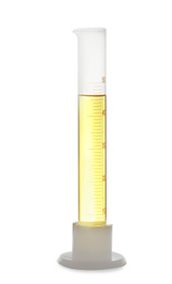 Photo of Graduated cylinder with yellow liquid isolated on white