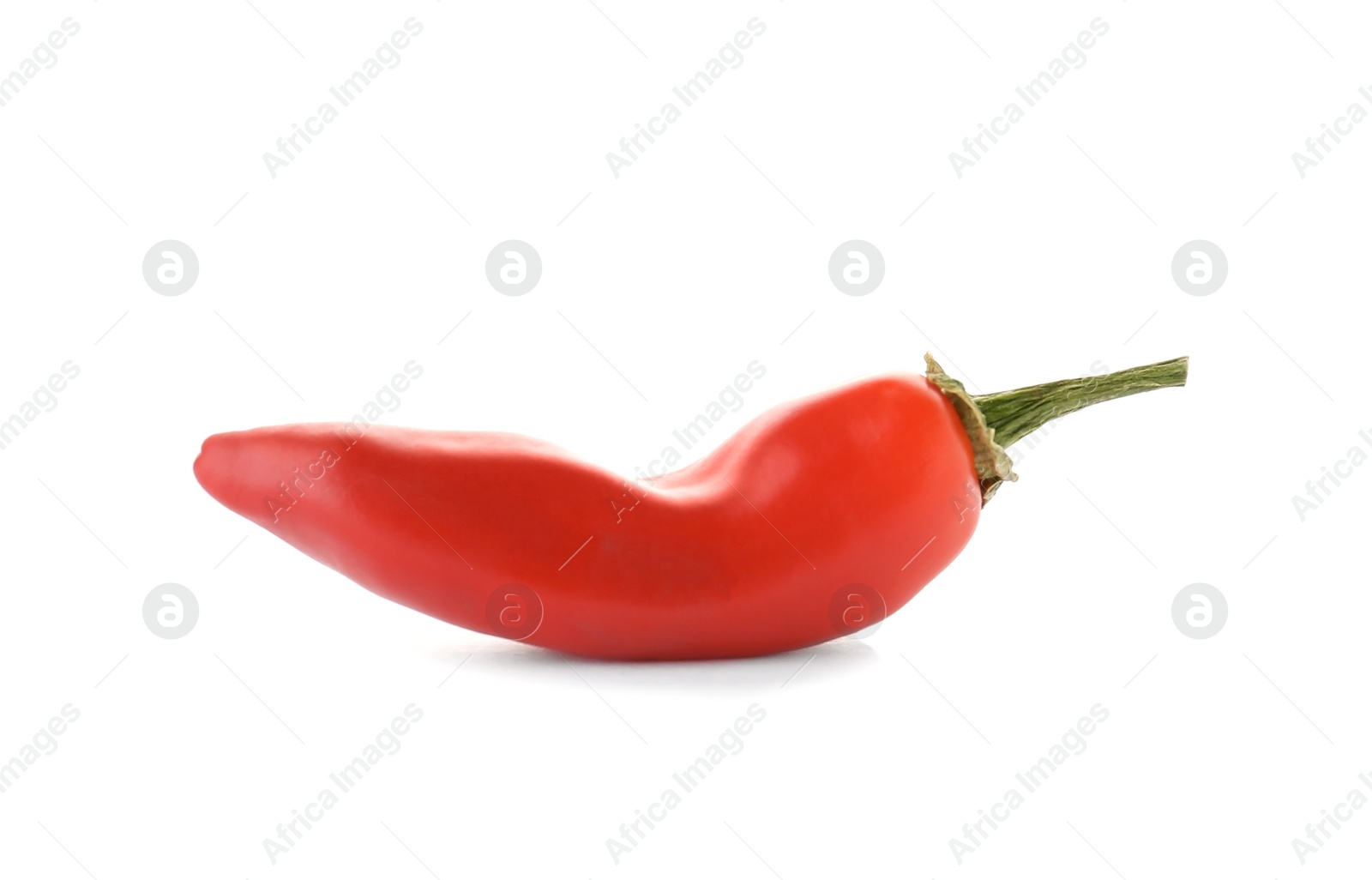 Photo of Ripe hot chili pepper on white background